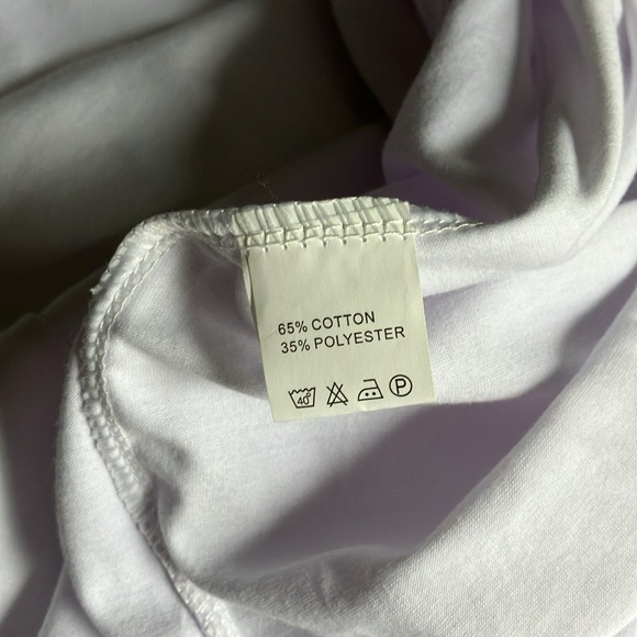 White beach dress with halter top and petal hem - Picture 9 of 9